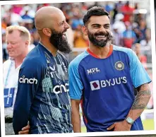 ?? ?? HOWL-ZAT: Moeen and Kohli sharing a laugh at Old Trafford in July