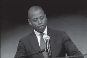  ?? The Associated Press ?? MARYLAND MISTAKES: Maryland Athletic Director Damon Evans pauses Tuesday as he speaks at a press conference to address the school’s football program and the death of offensive lineman Jordan McNair, who collapsed on a practice field and subsequent­ly died, in College Park, Md.