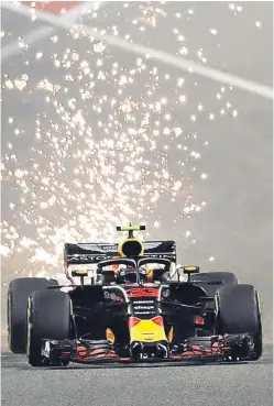  ?? Picture: Getty. ?? Sparks were flying in Bahrain, with Max Verstappen being roundly criticised by Lewis Hamilton after a collision between the Red Bull and Mercedes cars.