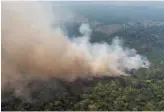  ?? VICTOR R. CAIVANO/AP ?? Fire consumes an area near Porto Velho, Brazil, on Friday.