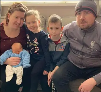  ??  ?? Baby Jack settling into life at home with his parents, Clodagh and Alan Rossiter, and his siblings Dan and Lily.