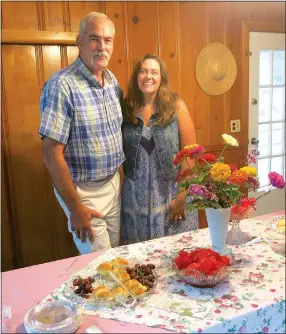  ?? Photo by Susan Holland ?? Steve Mitchael (left), chairman of the Gravette historical museum commission, poses with Sheila Martin at a reception in her honor Saturday at the museum. Martin had served as hostess to visitors at the museum for almost 12 years before leaving...