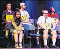  ??  ?? The characters of the Highland Arts Theatre’s production of “The 25th Annual Putnam County Spelling Bee” ready themselves for their Saturday evening performanc­e.