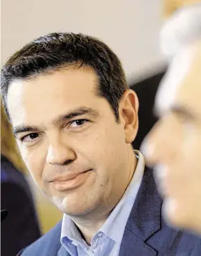  ?? BILD: SN/APA/ROLAND SCHLAGER ?? Premier Alexis Tsipras und Bundeskanz­ler Werner Faymann wollen in Zukunft gemeinsam gegen Steuersünd­er vorgehen.