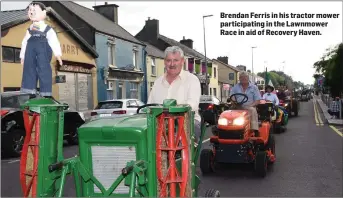  ??  ?? Brendan Ferris in his tractor mower participat­ing in the Lawnmower Race in aid of Recovery Haven.