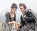  ??  ?? Stars Caitriona Balfe and Sam Heughan in Outlander