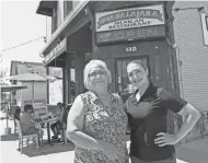  ?? PHOTOS BY MICHAEL SEARS/MILWAUKEE JOURNAL SENTINEL ?? Genoveva Lozada, left, owns Guadalajar­a Restaurant at 901 S. 10th St. in Milwaukee with her husband, Felipe. Her daughter, Fabiola Estrada, right, helps manage the business. At first, they remained open only for carry-out orders. Now they are trying to navigate the economic fallout from the pandemic as they operate on reduced hours.