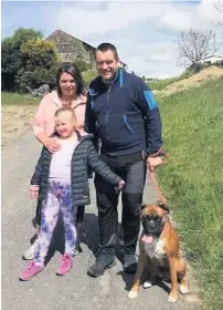  ??  ?? Rebecca pictured with mum and dad Kate and Garry, and their dog Lola
