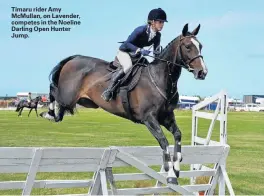  ??  ?? Timaru rider Amy McMullan, on Lavender, competes in the Noeline Darling Open Hunter Jump.