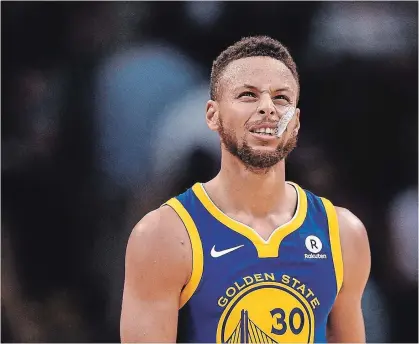  ?? XIA YIFANG TNS ?? Stephen Curry and the Golden State Warriors face a difficult situation as playoffs loom.