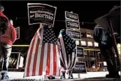  ?? MATT ROURKE/AP ?? Sanders’ backers gather ahead of Thursday’s debate at the University of New Hampshire to show their support.