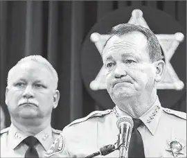  ?? Gina Ferazzi Los Angeles Times ?? THE SUDDEN RETIREMENT of Assistant Sheriff Michael Rothans, left, means Sheriff Jim McDonnell will not have to decide whether to discipline him.