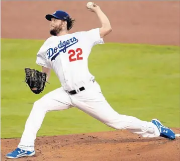  ?? CHRISTIAN PETERSEN/GETTY ?? Dodgers ace Clayton Kershaw dominated the Astros in Game 1 of the World Series, striking out 11 and allowing three hits.