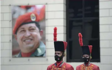  ?? (Sipa) ?? Un retrato de Hugo Chávez en Caracas.