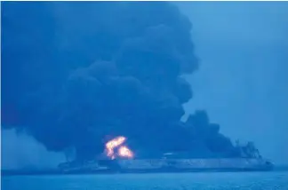  ?? AFPPIX ?? is seen ablaze in open waters after a collision with a cargo ship yesterday, in this handout from the Korea Coast Guard.