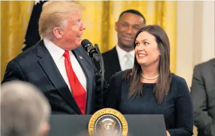  ?? Photo / AP ?? Donald Trump called Sarah Sanders to the stage at the East Room of the White House yesterday to thank her for her support.