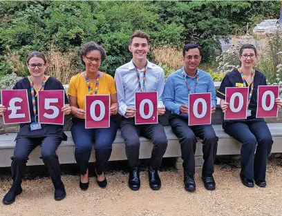  ?? ?? The Nuclear Medicine Team celebratin­g the £500,000 raised