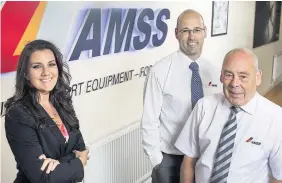  ?? HUW JOHN ?? > From left, Emma Borrington, of Berry Smith, with Scott and Duncan Barber, of AMSS