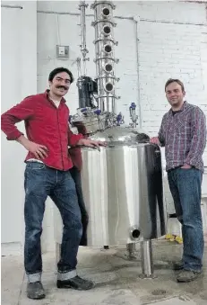  ?? Supplied ?? Charles Benoit, right, and partner Jesse Razaqpur, founded Toronto Distillery Co. They are both practising lawyers.
