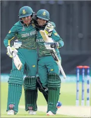  ?? Picture: GETTY IMAGES ?? WINNING HITTER: South Africa’s Shabnim Ismail, right, celebrates with Sune Luus after hitting the winning runs during the Women’s World Cup match against Pakistan