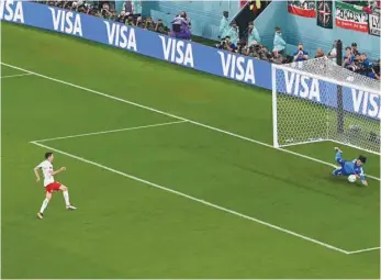  ?? (AFP) ?? Mexico’s goalkeeper Guillermo Ochoa stops a penalty kick by Poland’s forward Robert Lewandowsk­i during the FIFA World Cup Qatar 2022 Group C match at the Stadium 974 in Doha yesterday.