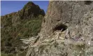  ??  ?? The Baishiya Karst Cave above the Jiangla riverbed, where the Denisovan jawbone was found. Photograph: Dongju Zhang/AP