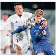  ?? FOTO: DPA ?? Timo Werner (r.) im Zweikampf mit Madrids Eder Militao.