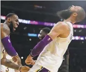  ?? Marcio Jose Sanchez Associated Press ?? THE LAKERS’ Tyson Chandler roars with delight after delivering a game-saving blocked shot.