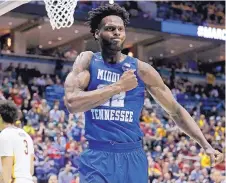  ?? MORRY GASH/ASSOCIATED PRESS ?? Middle Tennessee’s JaCorey Williams reacts during Thursday’s game against Minnesota. The Blue Raiders won 81-72.