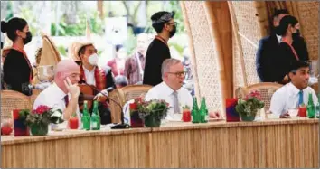  ?? (AFP) ?? (From left) FIFA President Gianni Infantino, Australia’s Prime Minister Anthony Albanese and Britain’s Prime Minister Rishi Sunak in Bali on Tuesday.