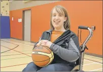  ?? LOUIS POWER/THE TELEGRAM ?? Melissa Day says she dreamed of playing sledge hockey since she was a little girl. Now, she plays sledge hockey and wheelchair basketball through Easter Seals.