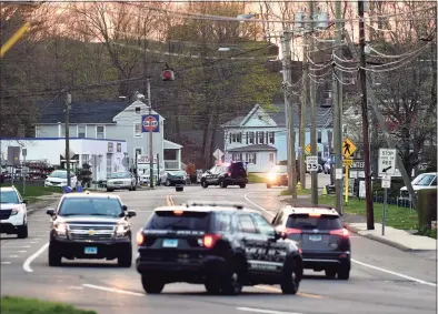  ?? Arnold Gold / Hearst Connecticu­t Media ?? Branford Police at the scene of a standoff on Main Street in Branford on Tuesday.