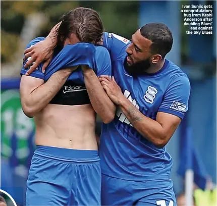  ?? ?? Ivan Sunjic gets a congratula­tory hug from Keshi Anderson after doubling Blues’ lead against the Sky Blues
