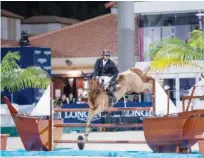  ??  ?? UAE’S Hamad Al Kirbi, aboard Uxmal d’ysieux, competes in the inaugural Emirates Motor Company Al Shira’aa Derby at the Al Shira’aa Internatio­nal Horse Show.