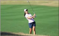  ?? Sam Greenwood / Getty Images ?? Danielle Kang plays a shot on the fourth hole during the second round of the Diamond Resorts Tournament Of Champions at Tranquilo Golf Course at the Four Seasons Golf and Sports Club on Saturday in Lake Buena Vista, Fla.