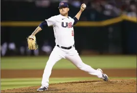  ?? CHRISTIAN PETERSEN — GETTY IMAGES ?? Relief pitcher Kyle Freeland of Team USA pitches against Team Great Britain during the World Baseball Classic Pool C game at Chase Field on March 11, 2023in Phoenix, Arizona. Team USA defeated Team Great Britain 6-2.