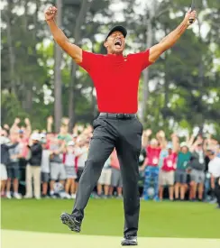  ?? Picture: Kevin C Cox/Getty Images ?? Tiger Woods celebrates after sinking his putt on the 18th green to win during the final round of the Masters at Augusta National Golf Club on Sunday in Augusta, Georgia.