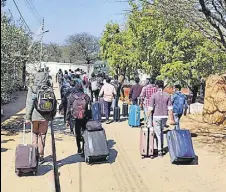  ?? ANI ?? Indians who were quarantine­d at the Manesar facility leave for home after being discharged on February 18.