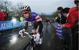  ??  ?? Right: Sylvain Chavanel,
sporting the French National Champion’s jersey, riding the only way he knows how in
the 2012 race