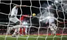  ?? Photograph: Phil Noble/Reuters ?? Virgil van Dijk (second left) heads home Liverpool’s first goal against Wolves from close range.