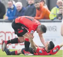  ??  ?? OPENER Crusaders scorer Paul Heatley (on ground) celebrates