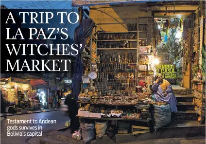  ?? PHOTOS BY JUAN KARITA/ASSOCIATED PRESS ?? A woman tends her shop of Andean amulets and offerings to the Pachamama, or Mother Earth, at the Witches’ Market in La Paz, Bolivia, earlier this month. At the market, people buy medicinal plants to heal their bodies and ward off curses, while yatiris...