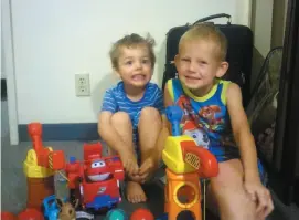  ?? FAMILY HANDOUT PHOTO ?? George Hazard-Benoit, 4, left, plays with step-brother Tobias, 5, at home. George was lost in the forest for about 32 hours and was found Sunday not much worse for wear. He was released from hospital on Tuesday.