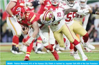  ??  ?? MIAMI: Patrick Mahomes #15 of the Kansas City Chiefs is tackled by Jaquiski Tartt #29 of the San Francisco 49ers Super Bowl LIV at Hard Rock Stadium on February 02, 2020 in Miami, Florida. — AFP