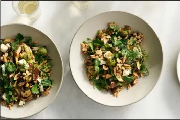  ?? ?? A fennel-farro salad, which gains savoriness from briny olives and sweetness from thinly sliced dates.