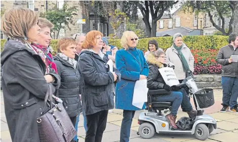  ?? Pictures: George McLuskie. ?? Supporters of Women Together in Fife at the protest in Kirkcaldy town centre.