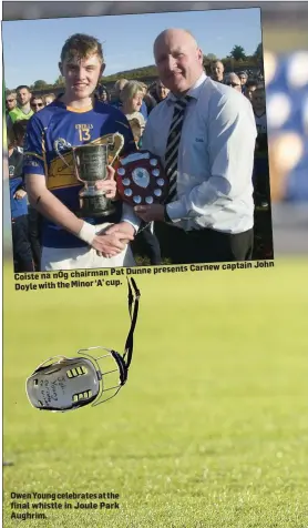  ??  ?? captain John Pat Dunne presents CarnewCois­te na nÓg chairman cup.Doyle with the Minor ‘A’ Owen Young celebrates at the final whistle in Joule Park Aughrim.