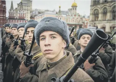  ??  ?? 0 Russian soldiers rehearse in Moscow’s Red Square for the military parade tomorrow – the 100th anniversar­y of the Bolshevik Revolution that triggered a civil war