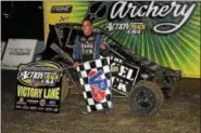  ?? RICK KEPNER - FOR DIGITAL FIRST MEDIA ?? Tim Buckwalter stands in victory lane after winning a race during the Ronnie Tobias Memorial on June 21 at Action Track USA in Kutztown.