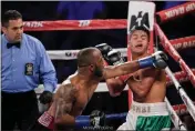  ?? SUBMITTED PHOTO ?? Mike “Yes Indeed” Reed lands a left jab to the jaw of Abraham Cordero in their bout at Madison Square Garden in June. Reed recorded a sixth-round knockout that night to keep his perfect record in tact at 19-0. He is fighting Friday night against Aaron...